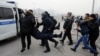 Задержание участников акции протеста против одномоментной девальвации тенге. Алматы, 15 февраля 2014 года.