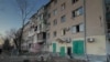Руйнування в Херсоні після одного з попередніх обстрілів