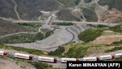 ARMENIA - Armenian lorries carriyng humanitarian aid for Nagorno-Karabakh are seen stranded near an Azerbaijani checkpoint set up at the entry of the Lachin corridor, July 30, 2023. 