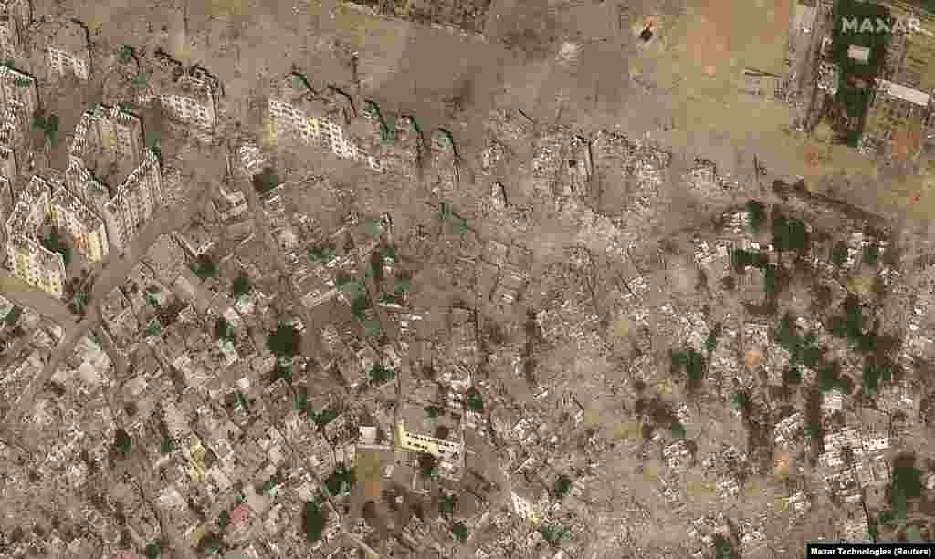 Tjetër pamje satelitore e qytetit Beit Hanun në Rripin e Gazës. Fotografia e parë është e 10 majit, e dyta e 26 tetorit 2023.