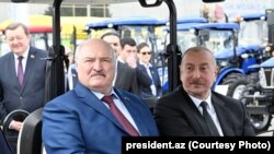 Azerbaijan - Presidents Alexander Lukashenko of Belarus and Ilham Aliyev of Azerbaijan visit exhibitions in Baku, May 16, 2024.