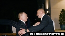 Архивска фотографија од рускиот претседател Владимир Путин и претседателот на Азербејџан Илхам Алиев