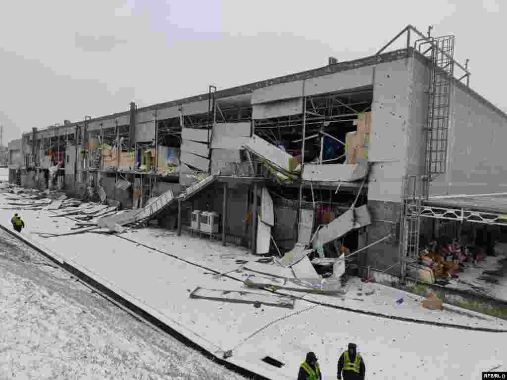 In Kryviy Rih, a 62-year-old was killed, and scores of private homes, apartment buildings, and this shopping center were damaged after nine Russian missiles slammed into the south-central city, according to Mayor Oleksandr Vilkul. Nearly 15,000 residents were left without power as temperatures plummeted.