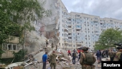 Blocuri de locuințe din Belgorod, după un atac cu rachete. 