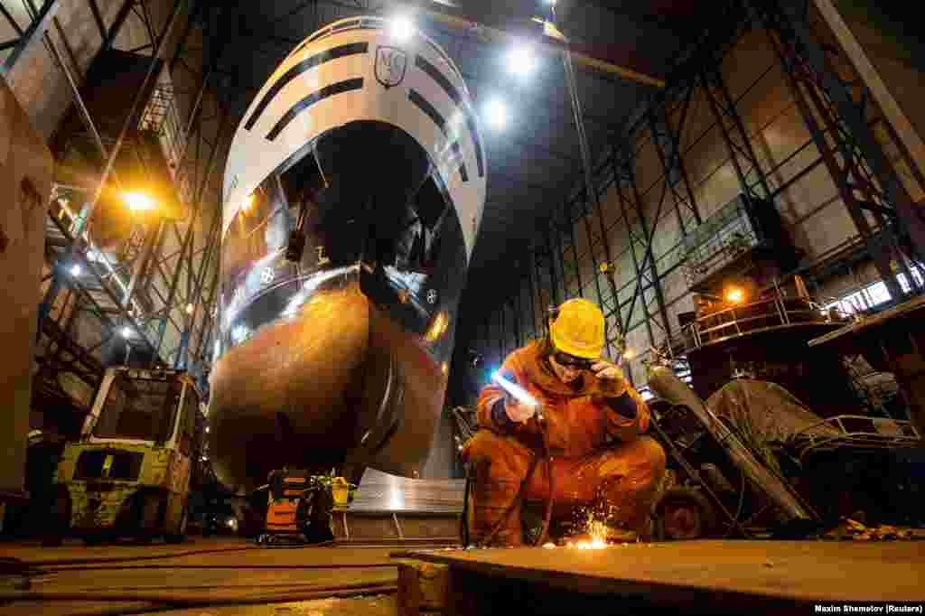 A welder inside a shipyard in Kirkenes, which gets most of its business repairing Russian vessels. The owner of the business told Reuters: “I don’t like that they build up the military on both sides of the border.... Here in the north, we work together to reduce tensions. We are trying not to be part of them.”