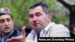 Armenia -- Armen Martirosian, deputy chairman of the opposition Zharangutyun party, is detained by riot police station during an opposition rally in central Yerevan, 9Apr2013.