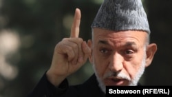 Afghan President Hamid Karzai speaks at a press conference in Kabul on October 4.