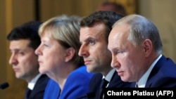 S lijeva na desno: Ukrajinski predsjednik Volodimir Zelenski, njemačka kancelarka Angela Merkel, francuski predsjednik Emmanuel Macron i ruski predsjednik Vladimir Putin u Parizu na konferenciji za medije u decembru 2020.
