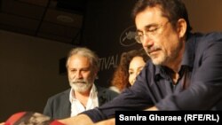 Слева направо - турецкий актер Халуг Бильгинэр, продюсер Зейнеп Озбатур атакан и и режиссер Нури Бильге Джейлан во время пресс-конференции в 67-м Каннском кинофестивале,19 мая 2014