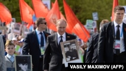 Президент Росії Володимир Путін під час акції «Безсмертний полк». Москва, 9 травня 2015 року