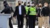Сашо Мијалков со полициска придружба пред Кривичниот суд во Скопје, пред изрекувањето на пресудата за „Таргет-Тврдина“
