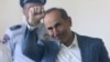 Armenia -- Former President Robert Kocharian greets supporters during his trial in Yerevan, May 15, 2019.