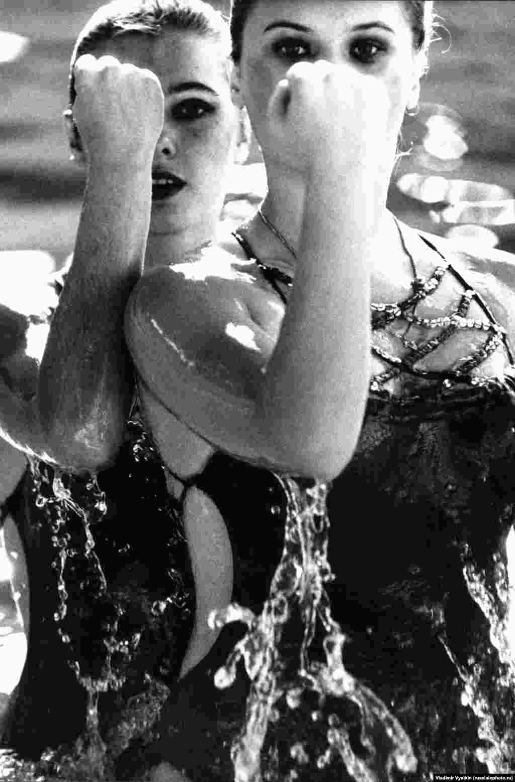 "Duet," a portrait of two synchronized swimmers. 