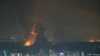 Fumul se ridică de la locul unei lovituri aeriene israeliene care a vizat un cartier din suburbia sudică a Beirutului la sfârșitul zilei de 6 octombrie 2024. Presa libaneză a relatat patru lovituri israeliene asupra sudului Beirutului duminică seară.
