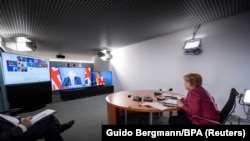 Германската канцеларка Ангела Меркел од Берлин учествува на онлајн состанокот на Г7 , 24.08.2021