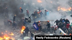 Площад в Киев след сблъсък между протестиращи и силите на реда на 20 февруари 2014 г.