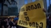 Рэп-протест на Руставели, или 20 лет за полицейского на цепи?