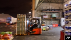 Piața de fructe și legume New Covent Garden din Londra. Comercianții se așteaptă ca o serie de produse să nu fie pe piață ca urmare a Brexit, ianuarie 2021.