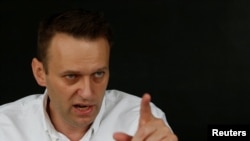Aleksei Navalnîi în cursul unui interviu cu agenția Reuters