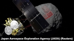 Графічне зображення зонду Hayabusa 2 на тлі астероїда Рюґу