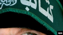 یکی از زنان شبه نظامی حماس در کمپی در نوار غزه