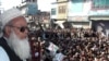The leader of an Islamic political party in Swat, Qari Abdul Waheed, addresses residents after the deal was struck on Shari'a law.