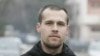 Marko Jaksic, a young lawyer and councilor in the Mitrovica Municipal Assembly in front of the party "Freedom, Democracy, Justice - Oliver Ivanovic"