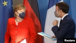 Berlin: cancelara germană Angela Merkel și președintele francez Emmanuel Macron, 18 iunie 2021.