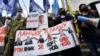 Під час Всеукраїнської акції протесту «Рік Зеленського – рік реваншу». Київ, 24 травня 2020 року 