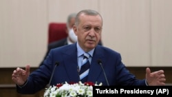 CYPRUS -- Turkey's President Recep Tayyip Erdogan addresses the Turkish Cypriot Parliament, in Nicosia, July 19, 2021. 