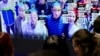 Posjetioci se vide na ekranu koji prikazuje tehnologiju prepoznavanja lica na izložbi Digital China u Fudžou, Kina (8. maj 2019.)
