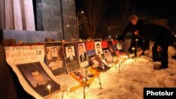 Armenia - Pictures of opposition supporters killed in Yerevan in March 2008 placed at the site of the deadly post-election unrest, 1Mar2012.