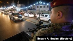 پلیس عراقی در حال گشتزنی در بغداد