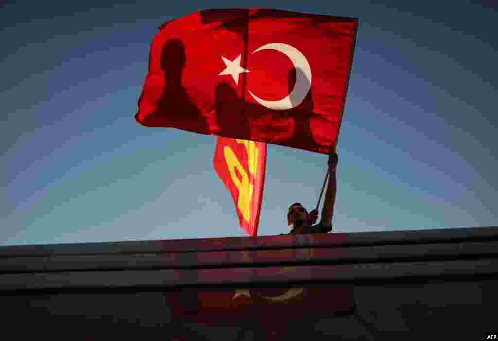 Trg Taksim, Istanbul, 9. juni 2013. Foto: AFP / Bulent Kilic