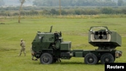As it battled a full-scale invasion by Russian forces, Ukraine became the world's third-largest arms importer globally, acquiring Western weapons systems, such as HIMARS rocket launchers like this one. (file photo)