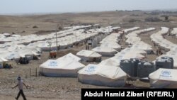 اردوگاه پناهجویان کرد سوریه در کَورگوسک، بیست کیلومتری غرب اربیل. ۱۷ اوت ۲۰۱۳.