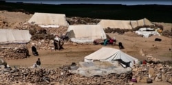 A makeshift settlement for seasonal migrants in rural Bamyan.