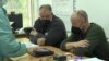 Биометриските уреди го забавија гласањето