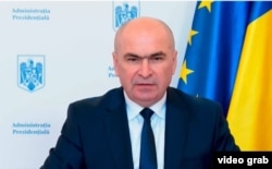 Ilie Bolojan, președintele interimar al României până la depunerea jurământului de noul președinte ales.
