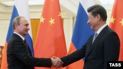 Президент Росії Володимир Путін і голова КНР Сі Цзіньпін, архівне фото