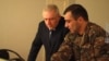 Armenian Defense Minister Vagharshak Harutiunian (left) and Karabakh army commander Mikael Arzumanian, December 3, 2020.