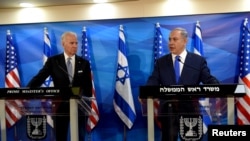 Președintele SUA Joe Biden (s) și premierul Israelului Benjamin Netanyahu (d) în timpul unei întâlniri la Ierusalim, 9 martie, 2016. În acea perioadă Joe Biden deținea funcția de vice-președinte al SUA. 