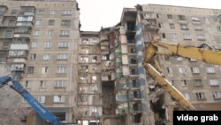 Көп кабаттуу үйдүн жарылуудан кийинки көрүнүшү. 11-январь, 2019-жыл. 