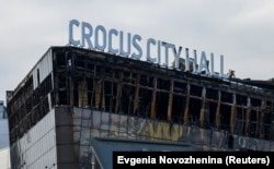 Обгоревшее здание «Крокус Сити Холла» после террористического нападения в марте 2024 года