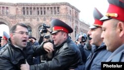 Armenia -- Opposition MP Armen Martirosian scuffles with police officers, 3Mar2011.