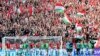 A magyar válogatott játékosai a szurkolókkal együtt ünnepelnek a magyar–francia Eb-meccs után 2021. június 19-én a Puskás Ferenc Stadionban