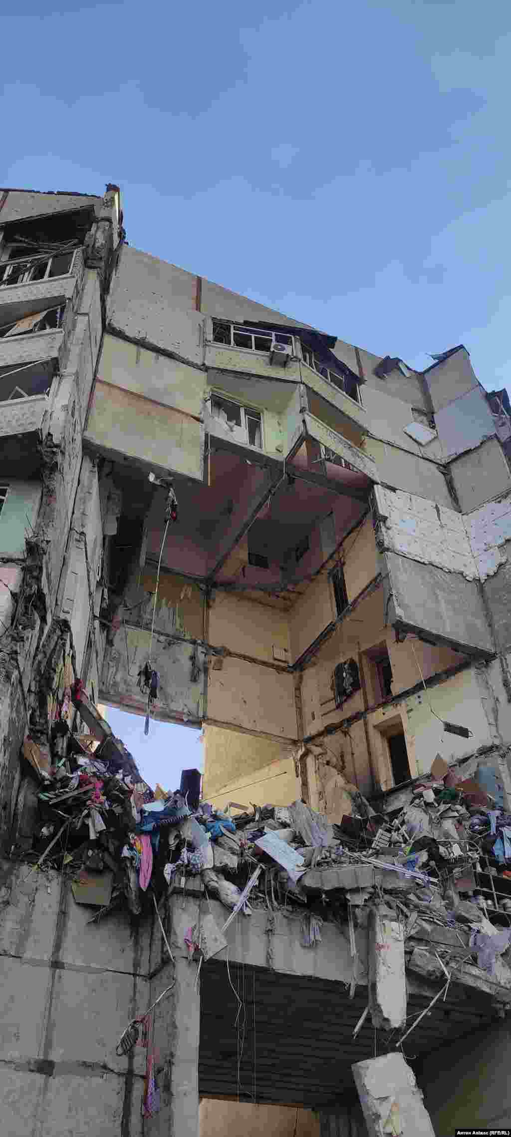 The damaged apartment block in Kharkiv, Ukraine's second-largest city Local authorities said the building had been hit once before, soon after the start of the 2022 Russian invasion. "It was almost repaired. All of the windows had been installed, insulated, and prepared for winter," Mayor Terekov posted on Telegram. 