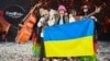 Kalush Orchestra nga Ukraina pas fitores në Eurovision më 15 maj. 