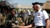 Armenia - The commander of the U.S. Army in Europe, Lieutenant General Mark Hertling, inspects Armenian peacekeeping troops in Yerevan, 18Jul2012.