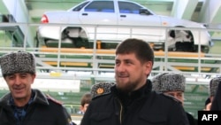 Ramzan Kadyrov (center) attends the opening ceremony for the Lada Priora assembly line in Chechnya in January 2012.